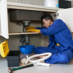 Copperhead plumber technician performing professional drain cleaning service